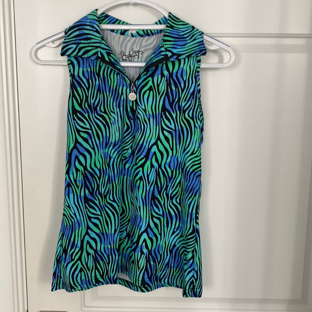 Tzu tzu golf top  Like new